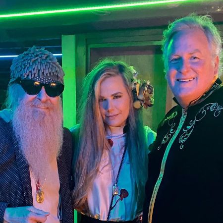Gilligan Stillwater and her rockstar husband, Billy F Gibbons, took a picture together with their friend at The Bryan Museum - Galveston.